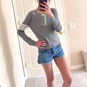 Gray Sweater with White Sleeve Stripes